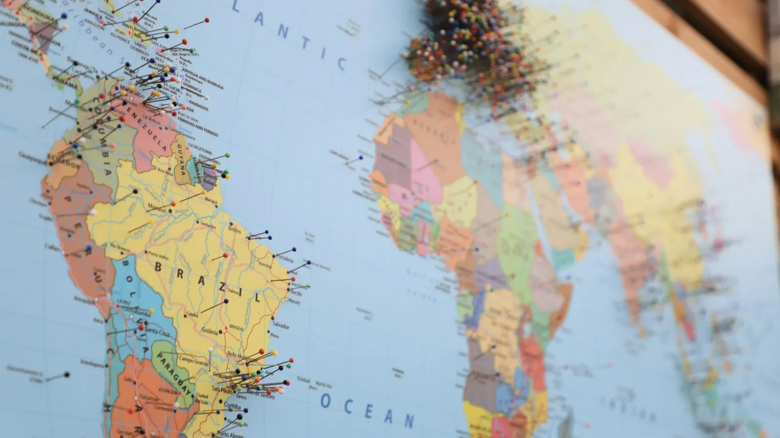 A world map with connection lines spanning continents, the cross-border footprint of the health and wellness workforce